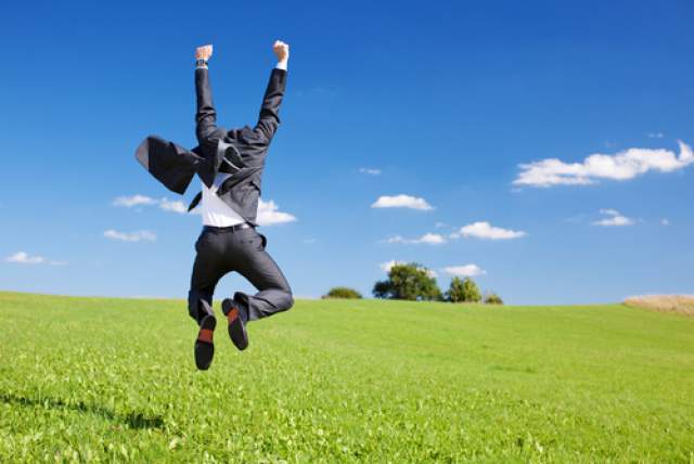 Energetic-Man-Suit-Happy-Jumping-For-Joy